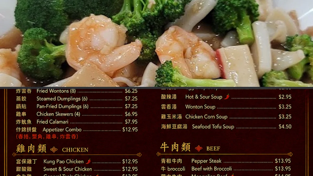 Crisp fried seafood beside rice.